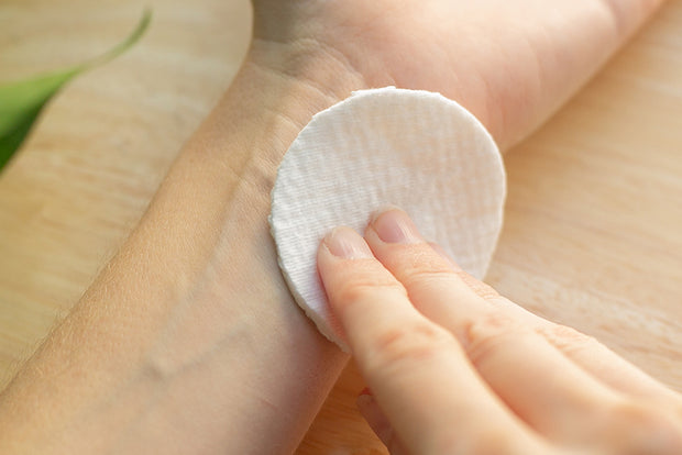 Dampen the tattoo paper with water