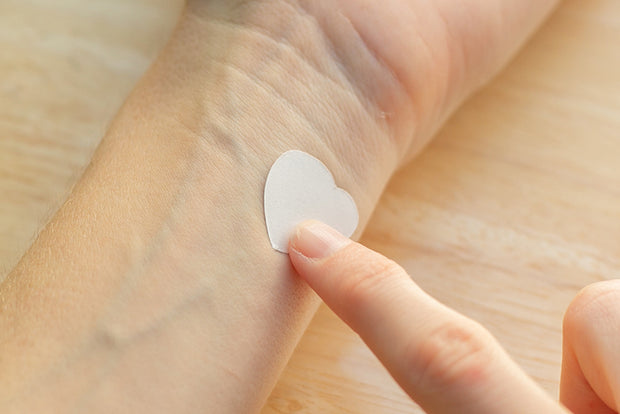 Stick the temporary tattoo onto your skin